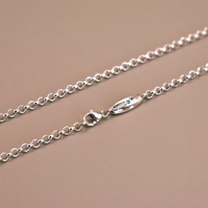 rtekde i 18 Kt guld, hvidguld eller sterling slv med en bl diamant