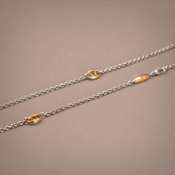 Elegant halskde i 18 Kt guld og hvidguld eller slv med en bl diamant