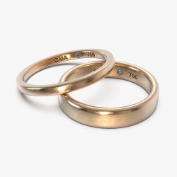 Vielsesringe i 18 kt guld med afrundede kanter