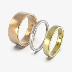 Vielsesringe i 18 kt guld med afrundede kanter